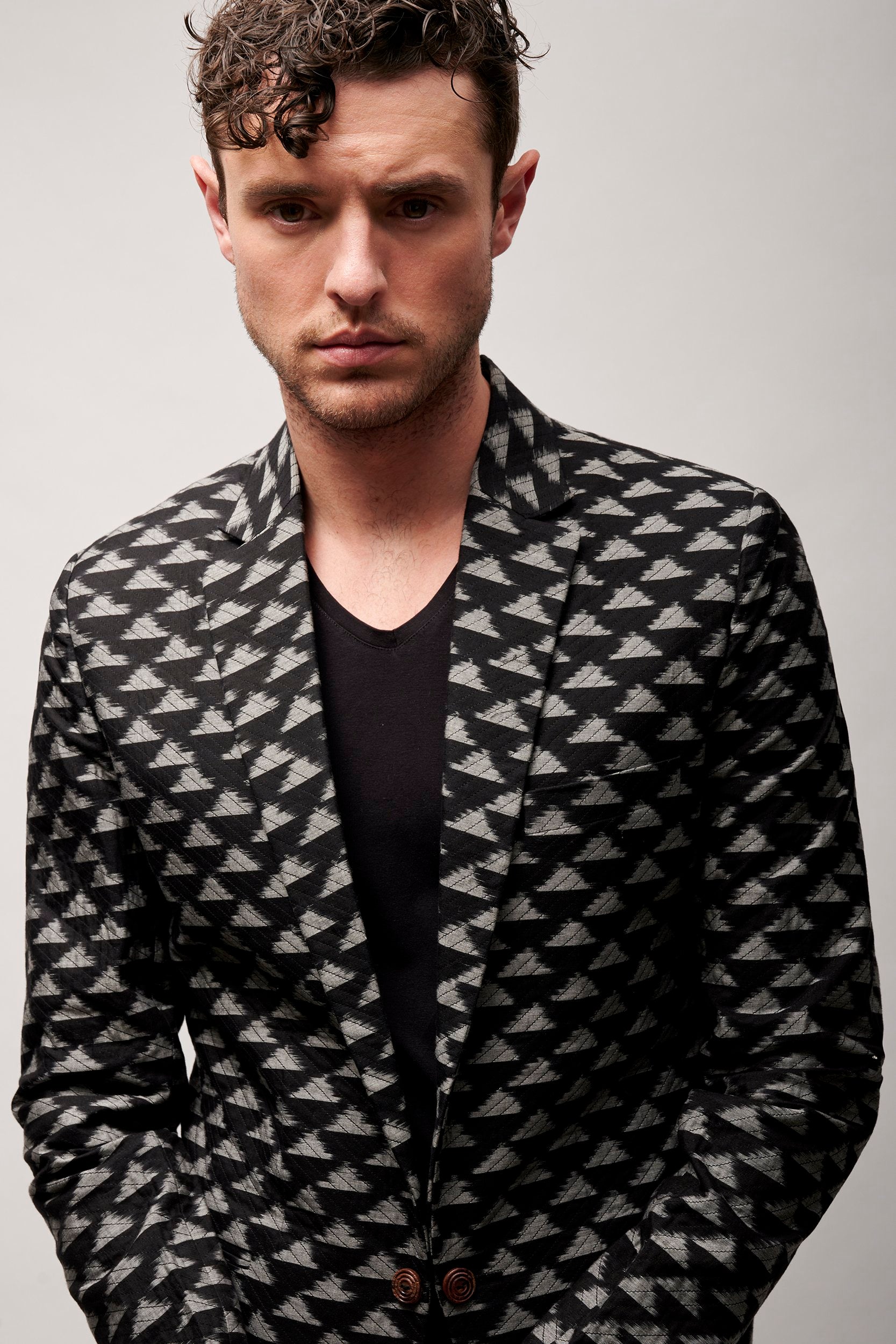 Men's Black and White Ikat Blazer with stitch-line details.