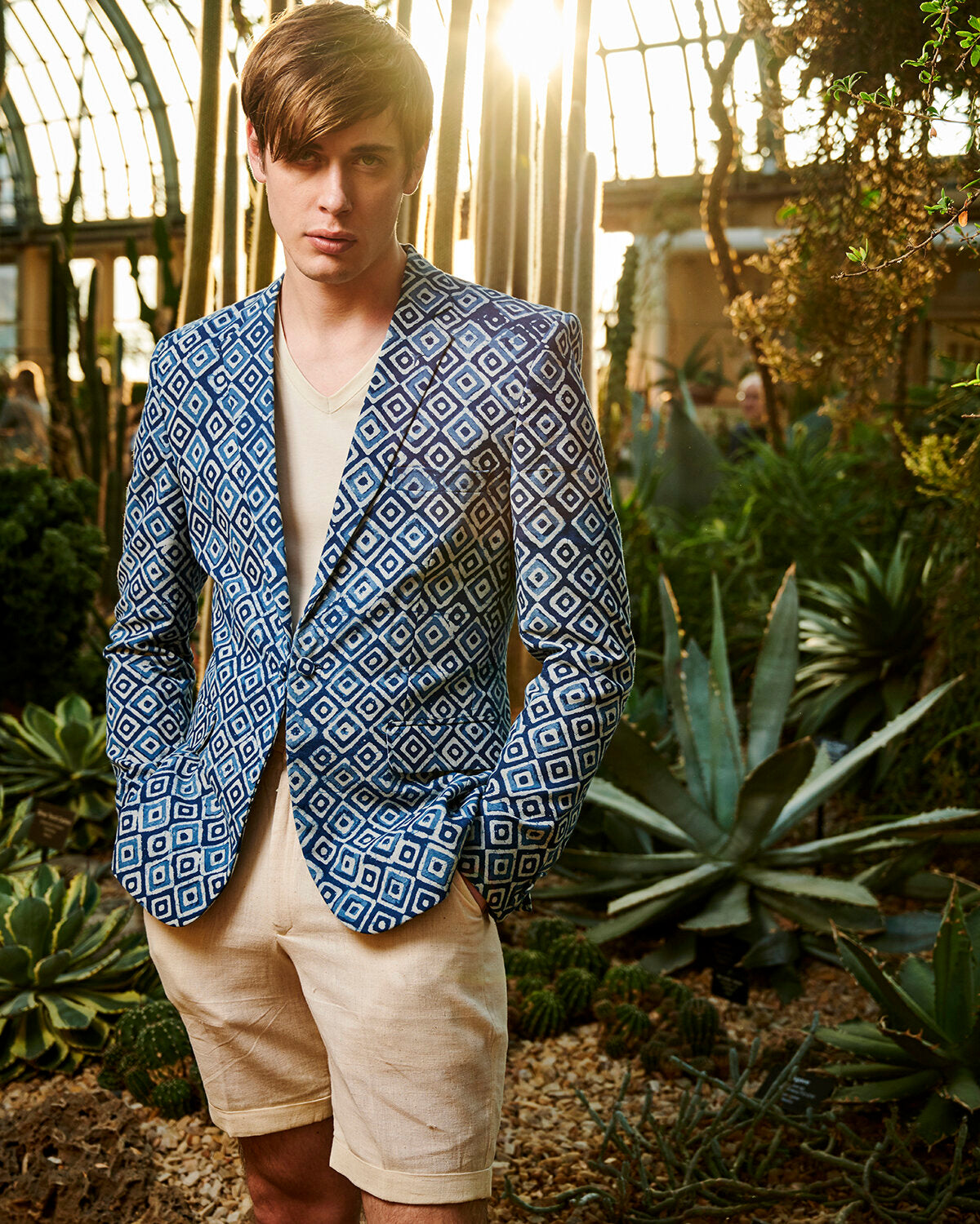 Model wearing a Indigo Blazer.Hand-block printed with nature-based dyes from plants and soil.